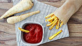 Vegan parsnip chips with kid's ketchup
