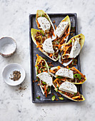 Lentil and chicory salad with fresh goat's cheese disks