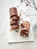 Chocolate roll with nuts and seeds