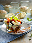 Black salsify salad with baby mozzarella and ham chips