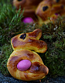 Baked Easter bunnies with coloured eggs