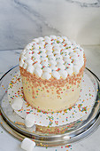 Marshmallow cake with sugar sprinkles