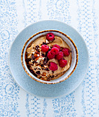Chocolate mousse with raspberries and nuts