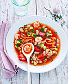 Tomato soup with prawns and vegetables