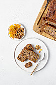 Healthy banana cake with walnuts and dried apricots