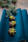 Chocolate-marzipan sandwich cookies with pistachios (Christmas)