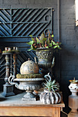 Urns and candlesticks with autumnal decorations