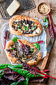 Swiss chard flatbreads with pine nuts