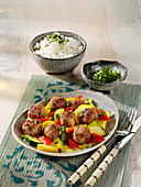 Asian meatballs with vegetables and rice