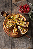 Cheese tart with walnuts and tomato salad