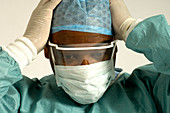 Surgeon holding his head