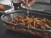 French fries cooked in a rotisserie