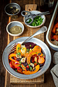 Pumpkin, sweet potatoes, carrot and beetroot baked with feta