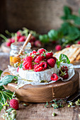 Camembert cheese with raspberries