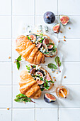 Croissants with fig, blue cheese and pine nuts