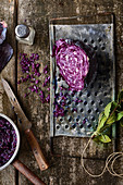 Red cabbage on an old vegetable grater