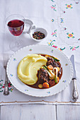 Beef neck with wine and vegetables