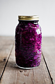 A jar of homemade red sauerkraut