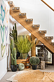 Oak and glass staircase with cacti