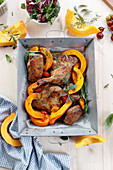 Duck in herbs roasted with pumpkin