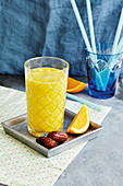Almond drink smoothie made with oranges and banana