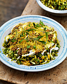 Bhel puri - a snack made from puffed rice, vegetables and tamarind sauce