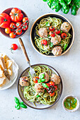 Pasta with pesto and meatballs