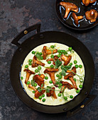 Girolles Malai (Indian clotted cream) with peas and mushrooms