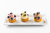 Cupcake with buttercream and blueberries