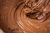 Mixing cake batter for a chocolate cake