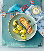 Fried salmon fillet with buttered potatoes