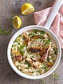 Baked risotto with peas and smoked mackerel