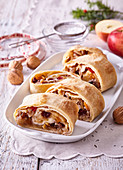 Apple strudel with dried fruits and nuts