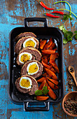 Meat roulade with Scottish eggs