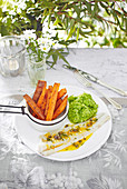 Lemon pollock with sweet potato chips and broccoli mash