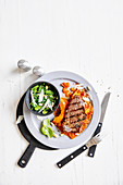 Beef steaks with pumpkin and spinach