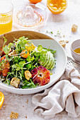Spring salad with avocado, chicken and blood oranges