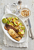 Trout fillet with light potato and avocado salad
