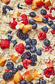 Oats with nectarines, berries and flaked almonds (full-frame)