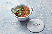 Oriental mountain lentil curry with coconut milk and tomatoes