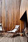 Deckchairs on wooden terrace