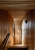 Landing on wood-panelled staircase