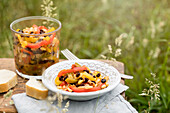 Pepper salad with pine nuts and currants