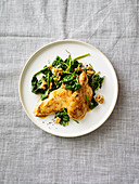 Chicken escalope with walnut spinach