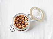 Honey and granola muesli in a flip-top jar