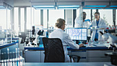 Team of scientists work in a laboratory