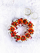 Clementine, cranberry and pistachio meringue wreath