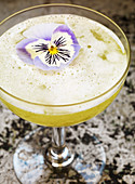 Yellow fairy cocktail (gin with syrup and egg white)