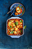 One-pot pasta casserole with antipasti vegetables and feta