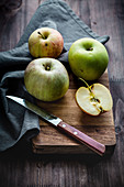 Apples on a wooden board